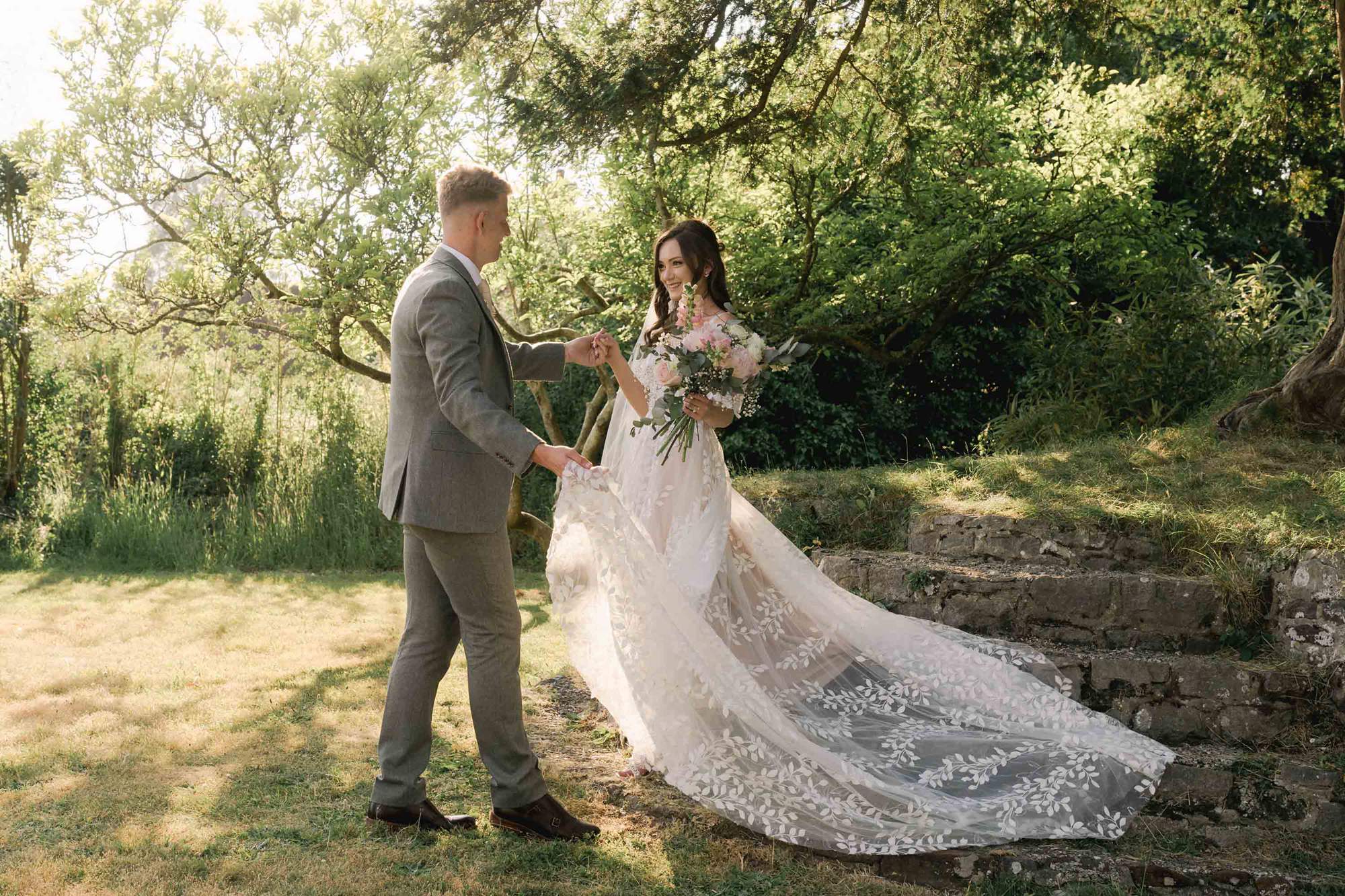 Bride and groom stare lovingly in to each other's eyes on their wedding day at Southdowns Manor.